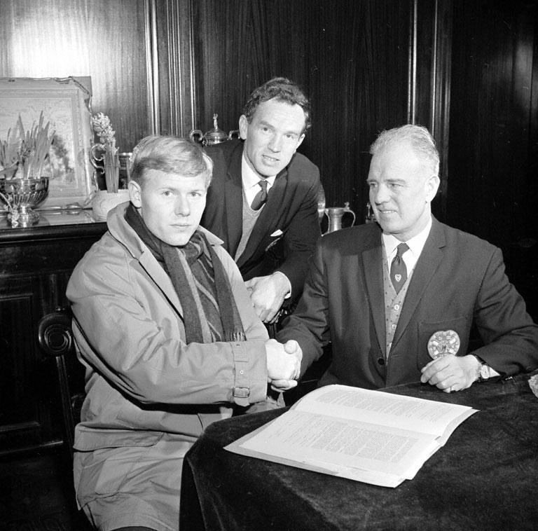 Danish centre forward, Rene Muller, gets a handshake from John Harvey as he signs for Hearts FC
