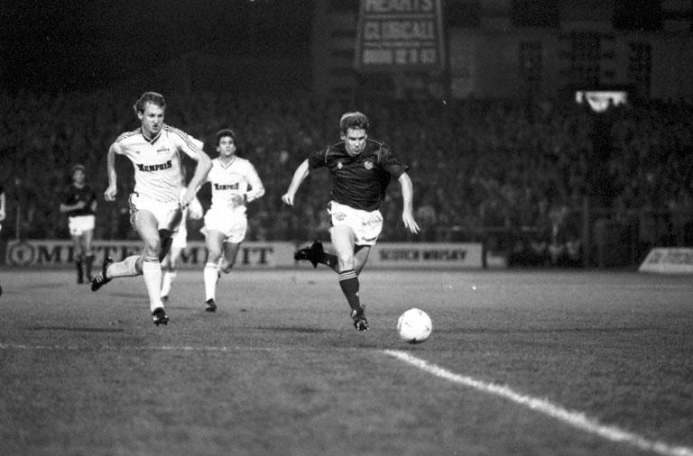 Hearts' Wayne Foster races for the ball during the Hearts v Austria Vienna UEFA Cup football match at Tynecastle in October 1988. Final score 0-0 draw