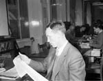 John Cumming Reads a proof of his dispatch article