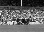 Police arrest football supporters after crowd trouble during the Hearts v Hibs Edinburgh derby match at Tynecastle in August 1978